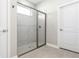 Shower featuring grey subway tile and glass door at 18100 Poston Ave, Port Charlotte, FL 33948