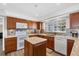 Kitchen features granite countertops, stainless appliances, and a tiled backsplash at 2005 21St W St, Palmetto, FL 34221