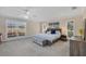 Bright main bedroom boasts natural light, neutral color scheme, and ample space, creating a peaceful retreat at 2005 21St W St, Palmetto, FL 34221