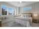 Bright and airy bedroom with a cozy window seat, plush pillows, and a comfortable king-size bed at 2213 Avenue C, Bradenton Beach, FL 34217