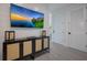 Hallway featuring modern decor and a TV on the wall at 2213 Avenue C, Bradenton Beach, FL 34217