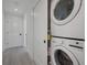 Convenient laundry area with stacked washer and dryer at 2213 Avenue C, Bradenton Beach, FL 34217