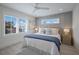 Inviting main bedroom with a comfortable bed, bright windows, and peaceful decor at 2213 Avenue C, Bradenton Beach, FL 34217