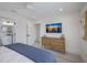 Spacious main bedroom with an attached bathroom and warm, inviting atmosphere at 2213 Avenue C, Bradenton Beach, FL 34217