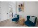 Sitting area with modern decor and blue chairs at 2213 Avenue C, Bradenton Beach, FL 34217