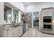 Well-equipped kitchen with stone countertops, stainless steel appliances, and ample cabinet space at 22343 Panther Loop, Bradenton, FL 34202
