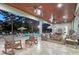 Expansive outdoor living area, complete with stone flooring, ceiling fans, and ample seating at 22343 Panther Loop, Bradenton, FL 34202