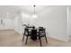 Cozy dining area featuring a round table and modern decor at 2430 Catalonia S Way, St Petersburg, FL 33712