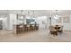 Bright, spacious kitchen featuring a waterfall island, barstool seating and contemporary design at 2430 Catalonia S Way, St Petersburg, FL 33712