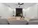 Inviting living room with a modern fireplace and stylish decor at 2430 Catalonia S Way, St Petersburg, FL 33712