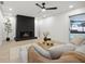 Comfortable living room featuring a fireplace and contemporary design at 2430 Catalonia S Way, St Petersburg, FL 33712