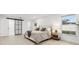 Spacious main bedroom featuring light walls, large windows, and a king-size bed at 2430 Catalonia S Way, St Petersburg, FL 33712