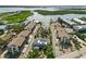 An aerial view highlights the location of the condos in proximity to the bay at 2729 North Beach Rd # 212, Englewood, FL 34223