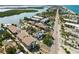 An aerial view highlights the condos location close to the bay at 2729 North Beach Rd # 212, Englewood, FL 34223