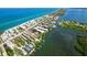 An aerial view showcases the proximity of the complexes to both the bay and beach at 2729 North Beach Rd # 212, Englewood, FL 34223