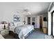 Serene bedroom with neutral walls and a king bed at 2729 North Beach Rd # 212, Englewood, FL 34223