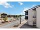 Attractive exterior view of condo complex featuring a waterfront pool area, palm trees, and well-maintained landscaping at 2729 North Beach Rd # 212, Englewood, FL 34223