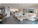 Spacious open floor plan featuring a living room and kitchen at 2729 North Beach Rd # 212, Englewood, FL 34223