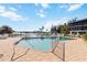 Enjoy waterfront views from this community pool, offering a refreshing escape with plenty of lounging space at 2729 North Beach Rd # 212, Englewood, FL 34223