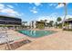 Relax and unwind by this community pool, complete with lounging chairs and ample space to sunbathe at 2729 North Beach Rd # 212, Englewood, FL 34223