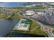 Aerial view of the area showcasing the resort, tennis courts, pools, and convenient parking at 303 9Th E Ave, Palmetto, FL 34221