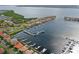 Waterfront homes featuring boat docks and scenic water access in this aerial view of the community at 303 9Th E Ave, Palmetto, FL 34221