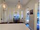 Bright breakfast nook next to the kitchen with an outdoor view, pendant lighting, and seating for four at 303 9Th E Ave, Palmetto, FL 34221