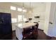 Bright kitchen with white cabinets, a center island, and modern appliances at 303 9Th E Ave, Palmetto, FL 34221