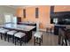 A well-equipped kitchenette with marble countertops, stainless steel appliances and comfortable seating perfect for casual dining at 303 9Th E Ave, Palmetto, FL 34221