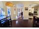 Beautiful living room with hardwood floors, an open floor plan, and a pool view at 303 9Th E Ave, Palmetto, FL 34221