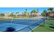 A community tennis court is a great place to get some exercise and have some fun in the sun at 303 9Th E Ave, Palmetto, FL 34221