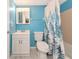 Well-lit bathroom with white marble floor and sink with cabinet at 3072 Lake Bayshore Dr # 119, Bradenton, FL 34205