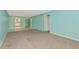 Open living room offering access to the kitchen and other areas of the home at 3072 Lake Bayshore Dr # 119, Bradenton, FL 34205