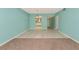 Inviting living room featuring modern tile flooring and soft, light blue walls at 3072 Lake Bayshore Dr # 119, Bradenton, FL 34205