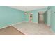 Open-concept living room showcasing modern tile floors and light blue walls at 3072 Lake Bayshore Dr # 119, Bradenton, FL 34205