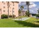 Outdoor recreation area with shuffleboard and scenic views at 3072 Lake Bayshore Dr # 119, Bradenton, FL 34205