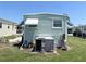 Exterior view of the home highlighting the air conditioning unit and the side of the residence at 3402 Shingle Oak Ter, Sarasota, FL 34237