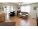 Open-concept living area seamlessly connected to the kitchen, creating a welcoming space at 3402 Shingle Oak Ter, Sarasota, FL 34237