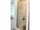 Shower behind glass door at 3402 Shingle Oak Ter, Sarasota, FL 34237