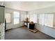 Cozy sunroom with plentiful windows at 3402 Shingle Oak Ter, Sarasota, FL 34237