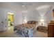 Cozy bedroom with a ceiling fan and lamps on bedside tables at 3500 El Conquistador Pkwy # 128, Bradenton, FL 34210