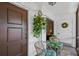 Cozy balcony with seating and view of a study inside the house at 3500 El Conquistador Pkwy # 132, Bradenton, FL 34210