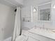 Clean bathroom features a shower/tub combo and plenty of storage at 3500 El Conquistador Pkwy # 132, Bradenton, FL 34210