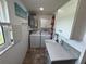 Laundry room with modern appliances and ample counter space at 3752 Collins St # 508, Sarasota, FL 34232