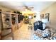 Spacious living room with comfortable furniture and an open concept design leading to the dining area at 390 301 W Blvd # 2C, Bradenton, FL 34205