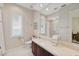 Elegant bathroom featuring a large mirror, and a neutral color palette at 4224 Boca Pointe Dr, Sarasota, FL 34238