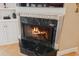 Elegant fireplace with marble surround and custom mantel in a well-lit living space at 4224 Boca Pointe Dr, Sarasota, FL 34238