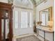 Bright foyer with high ceilings, chandelier, and marble-topped console table at 4224 Boca Pointe Dr, Sarasota, FL 34238
