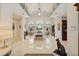 Spacious living room with high ceilings, marble floors, and natural light at 4224 Boca Pointe Dr, Sarasota, FL 34238