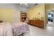 Bright bedroom with yellow walls, and neutral furniture at 4513 Hidden River Rd, Sarasota, FL 34240